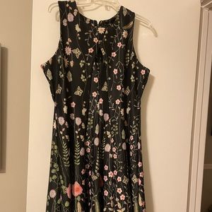 Sleeveless fit and flare scuba cutout with floral vine print dress
